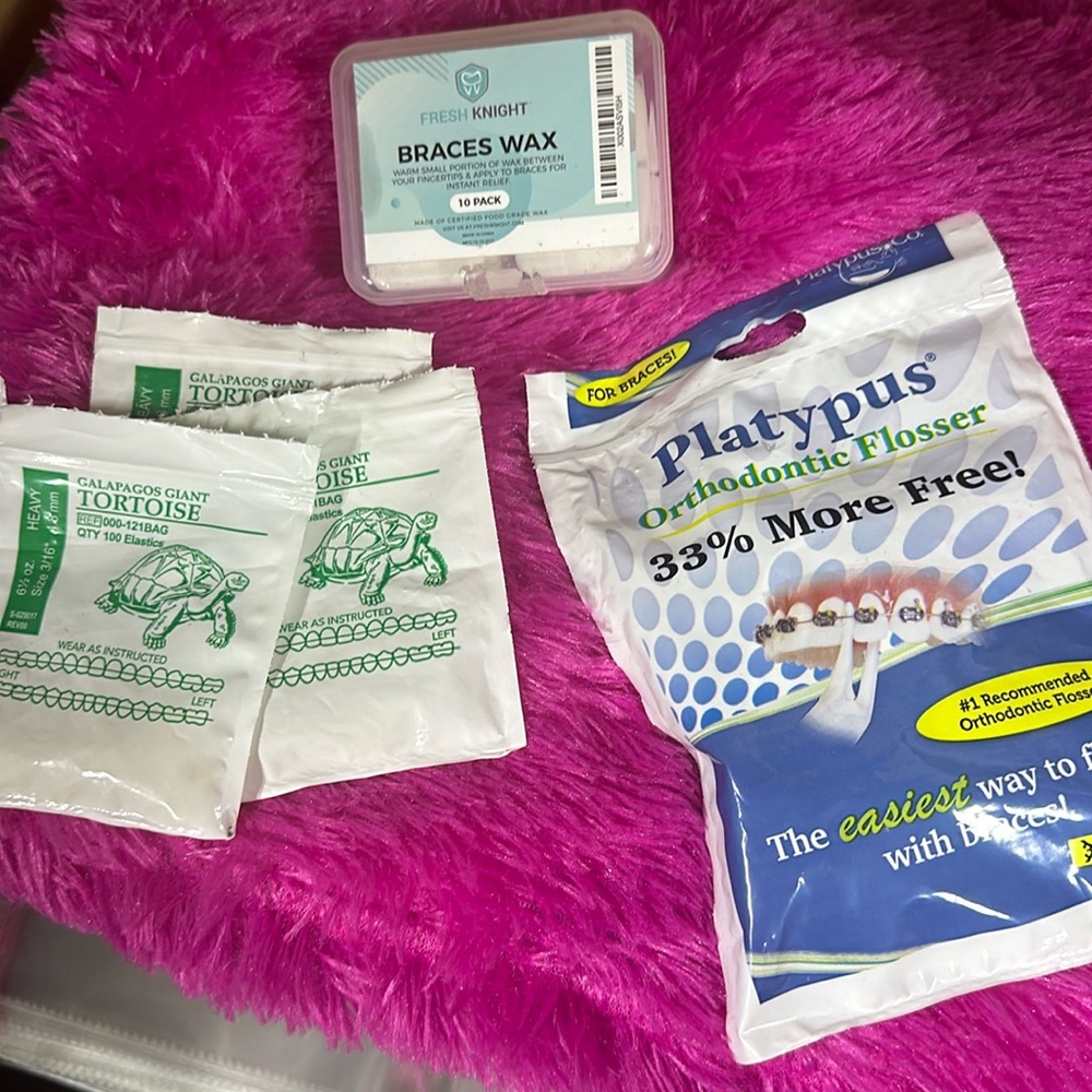 Braces necessities bundle. Flossers, wax and bands